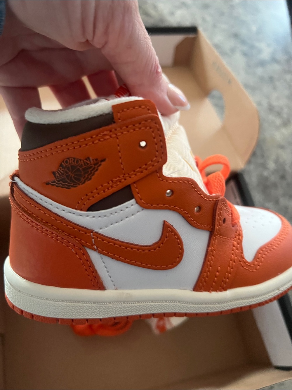Jordan 1 Retro High OG Sneakers in Orange and White